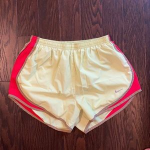 Nike dry fit running shorts. Size M. Highlighter yellow and pink
